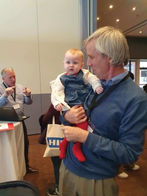 CIO Fran Thompson holding a baby at Galway Jobs Expo